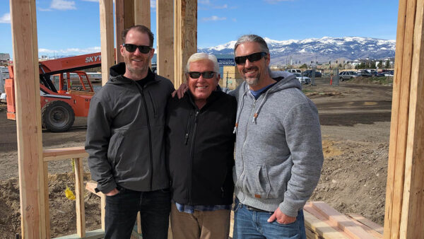 Ron, Ryan, and Dave of Oakmont Properties standing together at construction site.