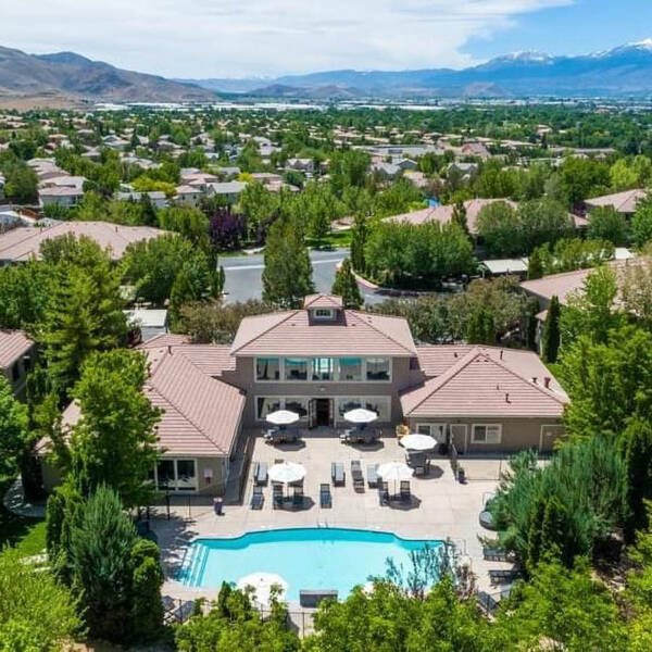 The Villas apartments with distant Wasatch mountains.