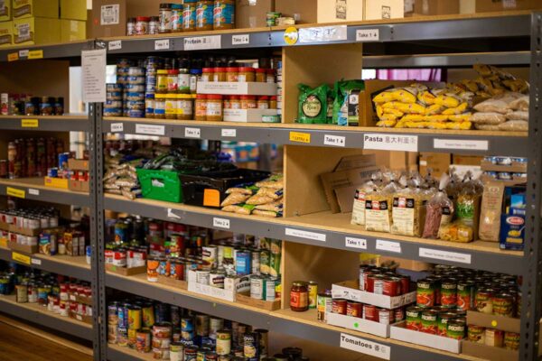 Pantry shelves stocked with dry goods.