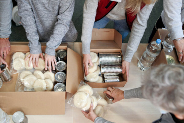 People volunteering at a food bank.
