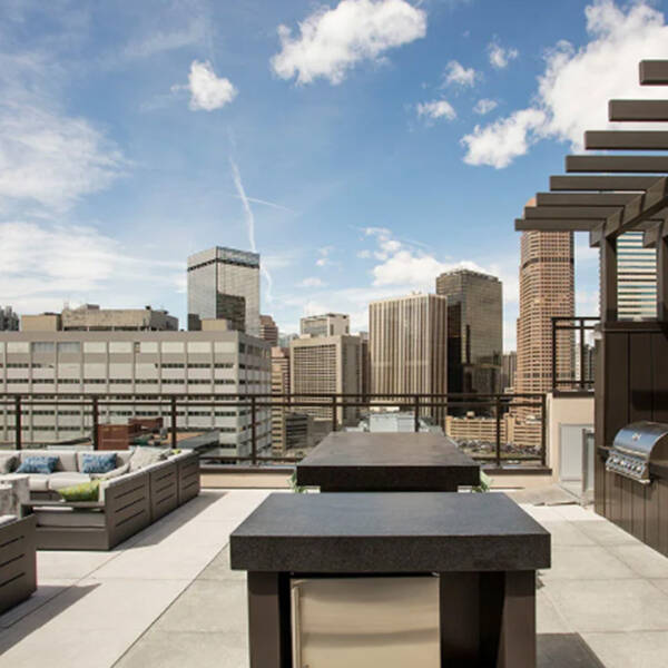Rooftop deck with outdoor grills.